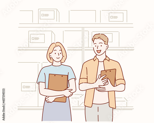 Young businesspeople  standing in warehouse. Hand drawn style vector design illustrations.