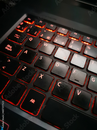 a computer keyboard with light