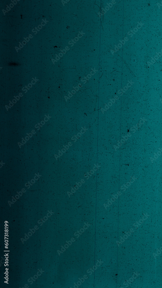 Dust scratches overlay. Distressed film texture. Weathered layer. Black grain particles noise on dark teal green blue color aged surface illustration abstract background.