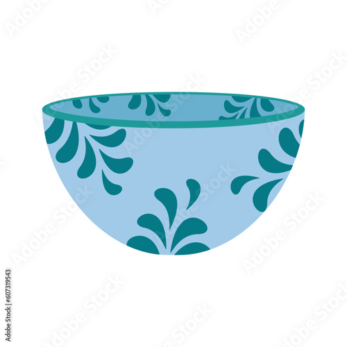 Dishes. A deep bowl for salad with a floral ornament.