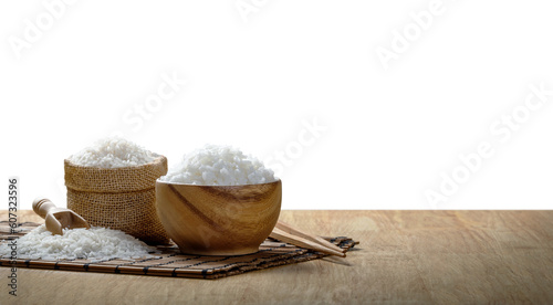 Rice and steamed rice in wooden bowl with the chopsticks on the wooden table with transparent background png