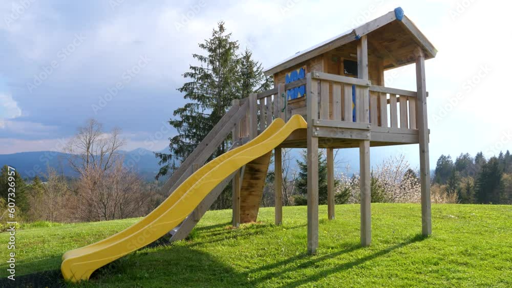Static Establishing Shot of Toboggan for Children in Natural Hill Garden Valley Static Establishing Shot of Toboggan for Children in Natural Hill Garden Valley