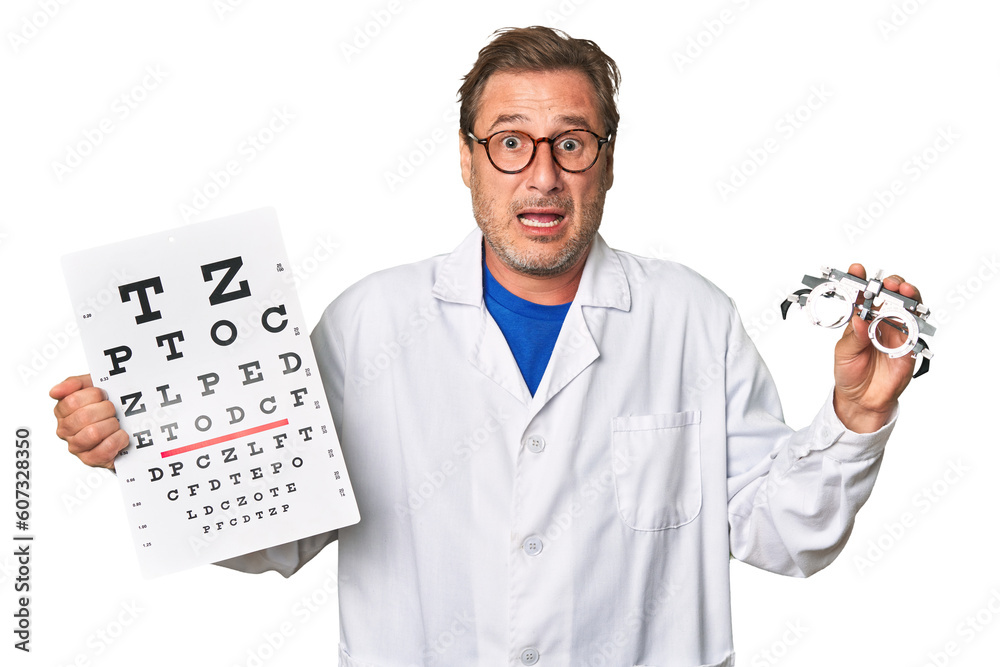 Experienced optometrist conducts eye exam with care, holding visual