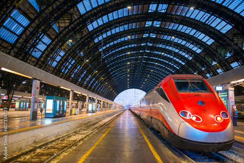 Railroad Station with a Train in Dusk in Milan, Lombardy in Italy.