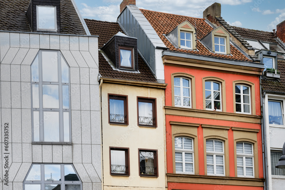 typical colorful mix of old and new buildings in cologne's friesenviertel district