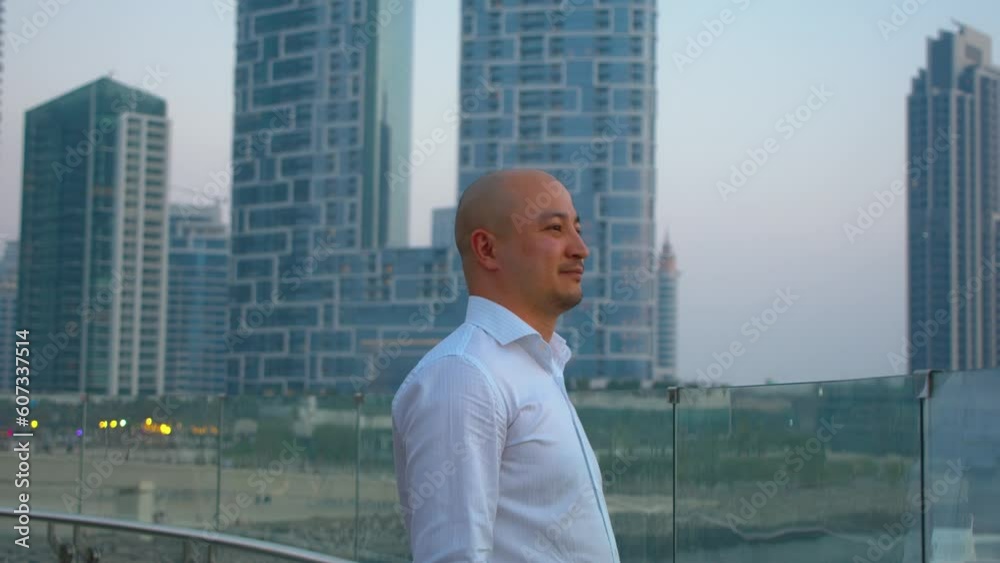 Asian bold businessmen dreaming of success Asian bold businessmen dreaming of success