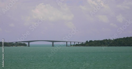Preah Sihanouk Kaoh Puos Bridge Ocean View in Cambodia. Zoomed Panning Shot. photo