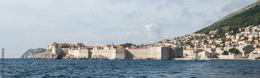 Panoramic view of the city walls and the cityscape of Dubrovnik from the Adriatic Sea. Croatia