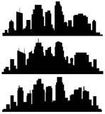 The landscape of buildings is silhouetted on white background.