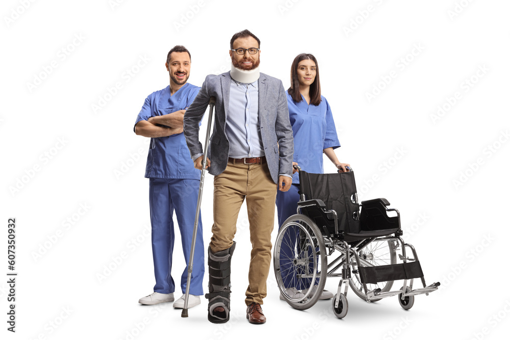 Health care workers with a wheelchair standing behind a man with cervical collar and walking brace Health care workers with a wheelchair standing behind a man with cervical collar and walking brace