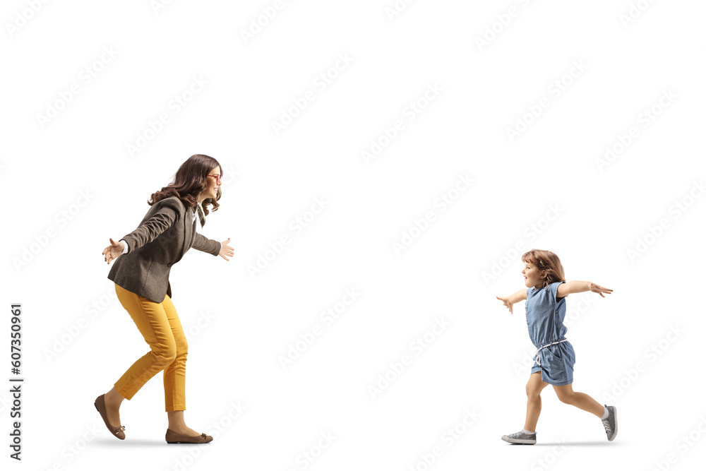 Girl spreading arms and running towards a young woman Girl spreading arms and running towards a young woman