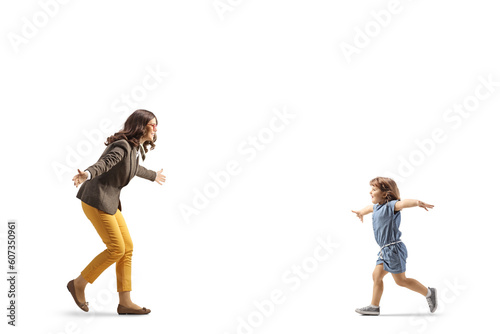Girl spreading arms and running towards a young woman