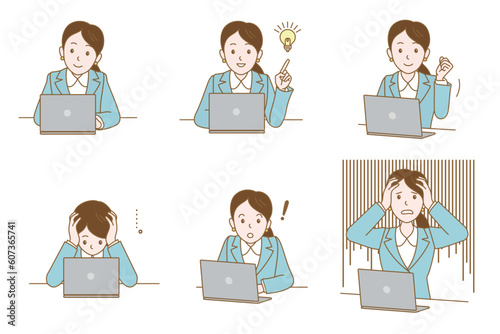 ノートパソコンに向かうスーツ女性