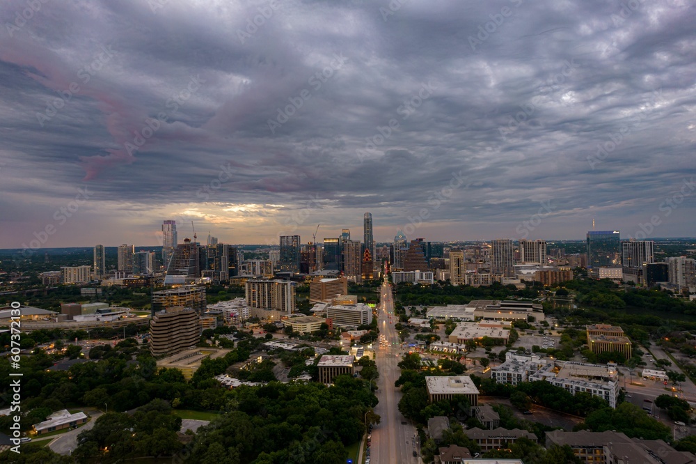 Naklejka premium Drone shot of Austin cityscape under stormy sky in Texas