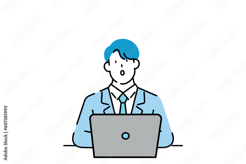 An office worker in front of his laptop An office worker in front of his laptop