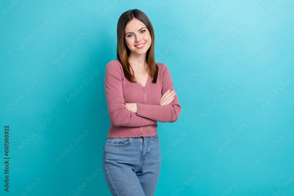 Portrait of friendly cute confident woman with stylish hairstyle wear purple shirt standing arms crossed isolated on blue color background Portrait of friendly cute confident woman with stylish hairstyle wear purple shirt standing arms crossed isolated on blue color background