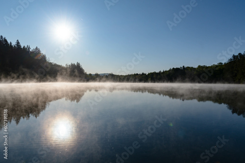 Morning lake fog early spring weather 