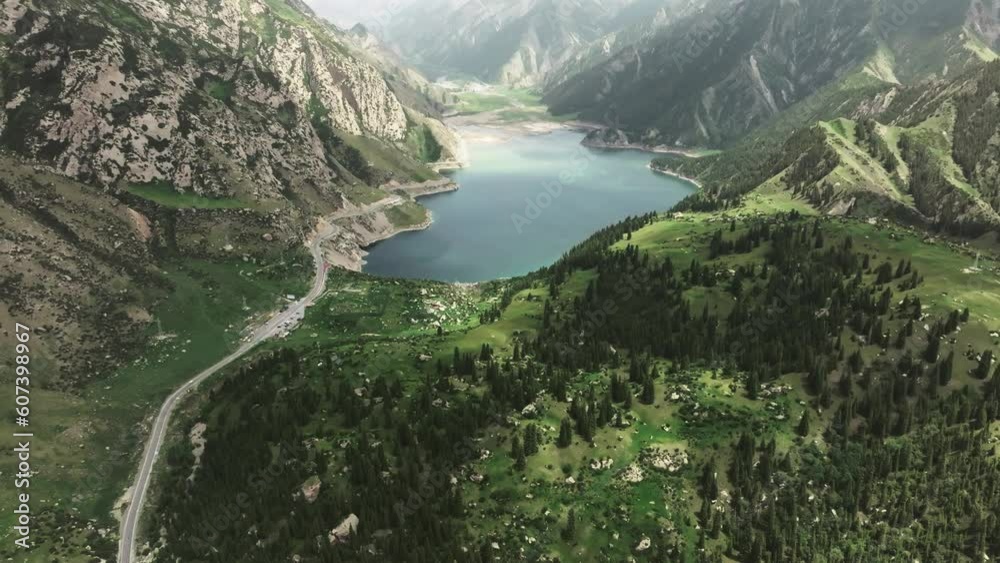 Aerial photography of the blue lake in the valley Aerial photography of the blue lake in the valley