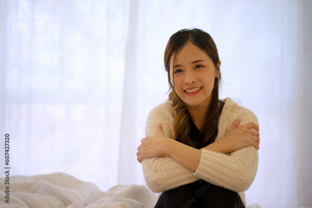 Pretty woman with encourage emotion sit on bed. Pretty woman with encourage emotion sit on bed.