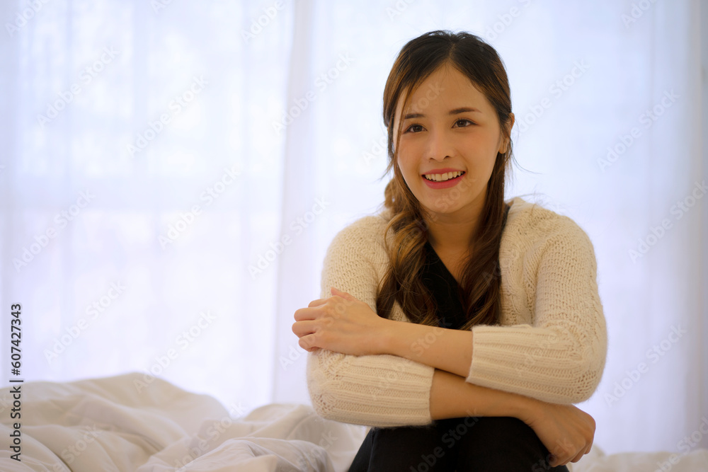 Pretty woman with encourage emotion sit on bed. Pretty woman with encourage emotion sit on bed.