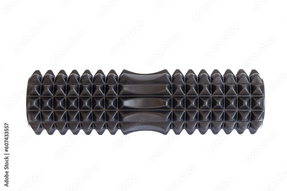 A black massage foam roller and isolated on a white background. Close-up. Foam rolling is a self myofascial release technique. Concept of fitness equipment. A black massage foam roller and isolated on a white background. Close-up. Foam rolling is a self myofascial release technique. Concept of fitness equipment.