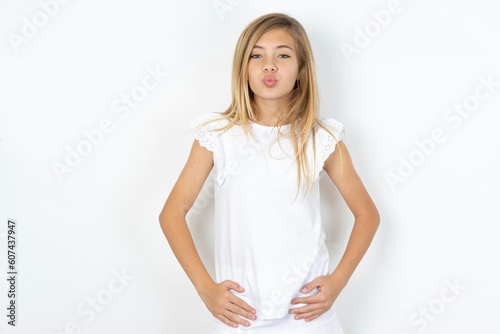 Canvas Print Portrait of lovely funny beautiful caucasian teen girl wearing white T-shirt ove