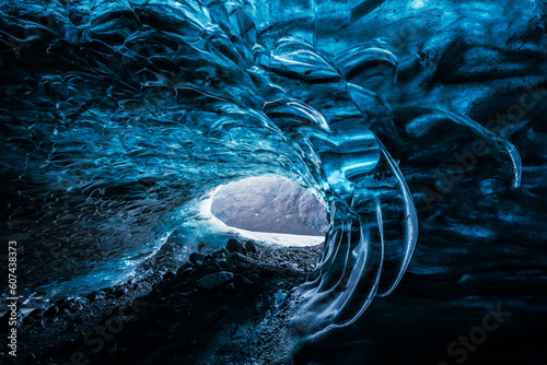 Ice Cave in Vatnajokull Glacier in Iceland - amazing colors create an unearthly atmosphere. photo