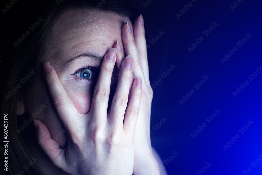 Woman is watching something scary. Close up scared girl face. Woman is watching something scary. Close up scared girl face.