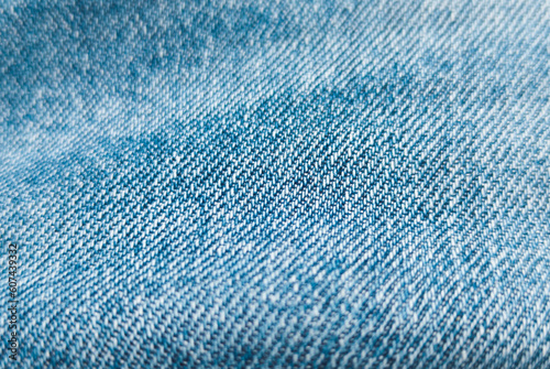 Blue hipster jeans material. Denim Cloth texture background. Natural fabrics textile. © Vadym