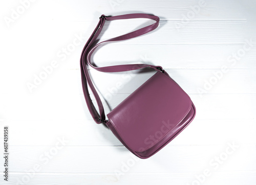 Fashionable modern pink women s bag or purse on a white background