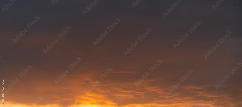 Beautiful bright summer sunset sky with clouds. Nature sky  background