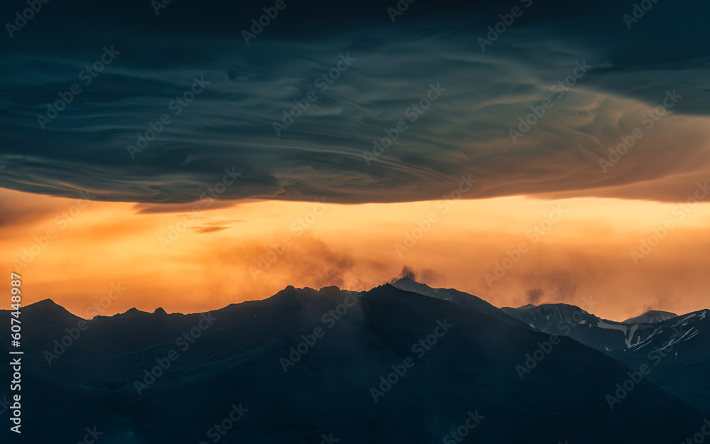 Dramatic of colorful sunset sky and Asperitas cloud over Icelandic mountain at Iceland