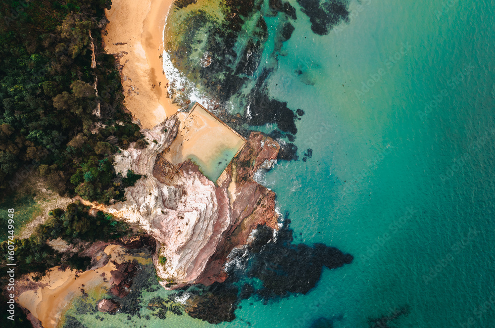 Aerial Drone Shot of Aslings Beach Rock Pool in Eden, New South Wales, Australia.