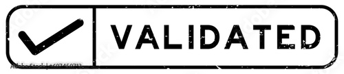 Grunge black validated word with right check mark icon square rubber seal stamp on white background