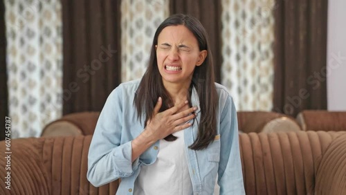 Indian woman feeling breathlessness and having Asthma attack
