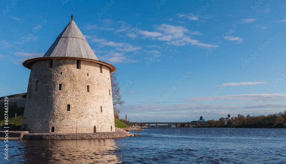 Coastal round stone tower of the Kremlin of Pskov in Russia
