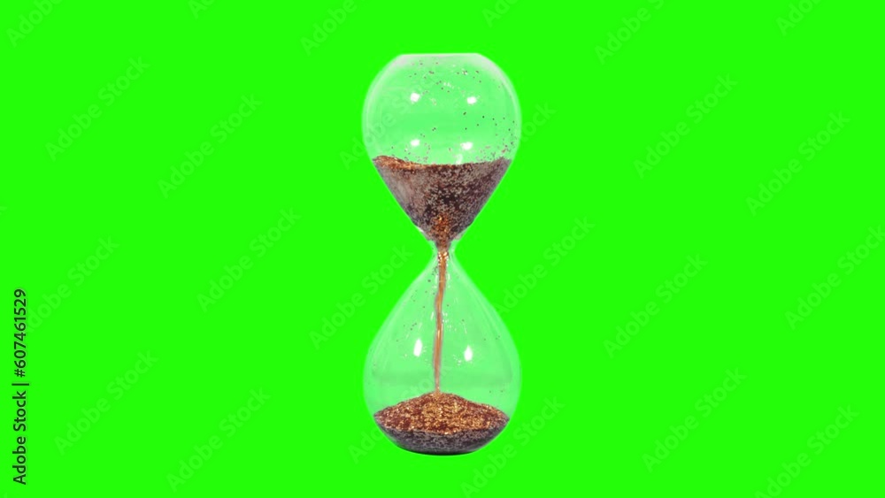 Golden hourglass on the light green screen