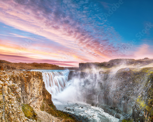 Breathtaking sunset view of the most powerful waterfall in Europe called Dettifoss.
