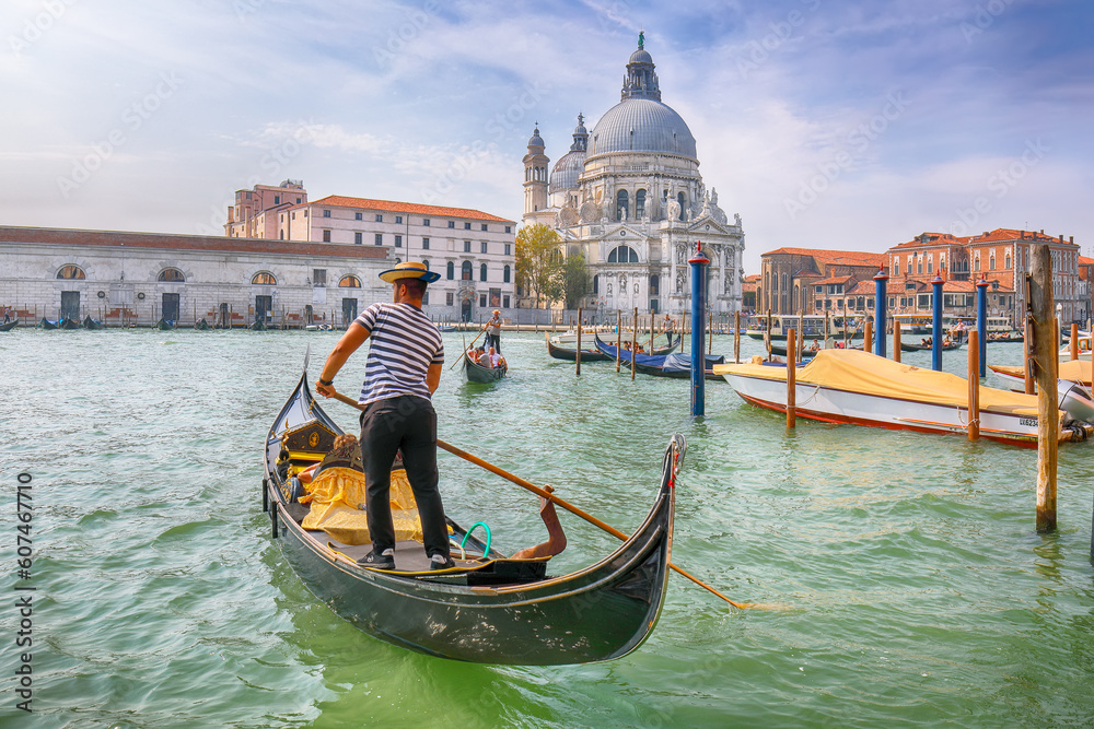 Fabulous morning cityscape of Venice with famous Canal Grande and Basilica di Santa Maria della Salute church.