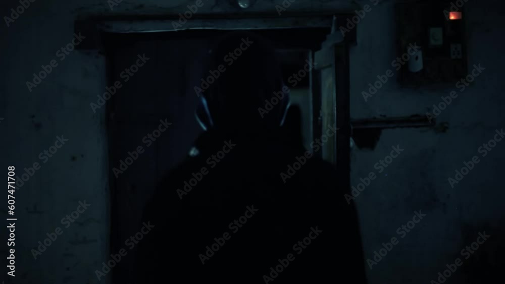 Scary shot of an old wooden door with light leaks from the wooden cracks, horror film-like footage. Full HD video 24 FPS. Scary shot of an old wooden door with light leaks from the wooden cracks, horror film-like footage. Full HD video 24 FPS.