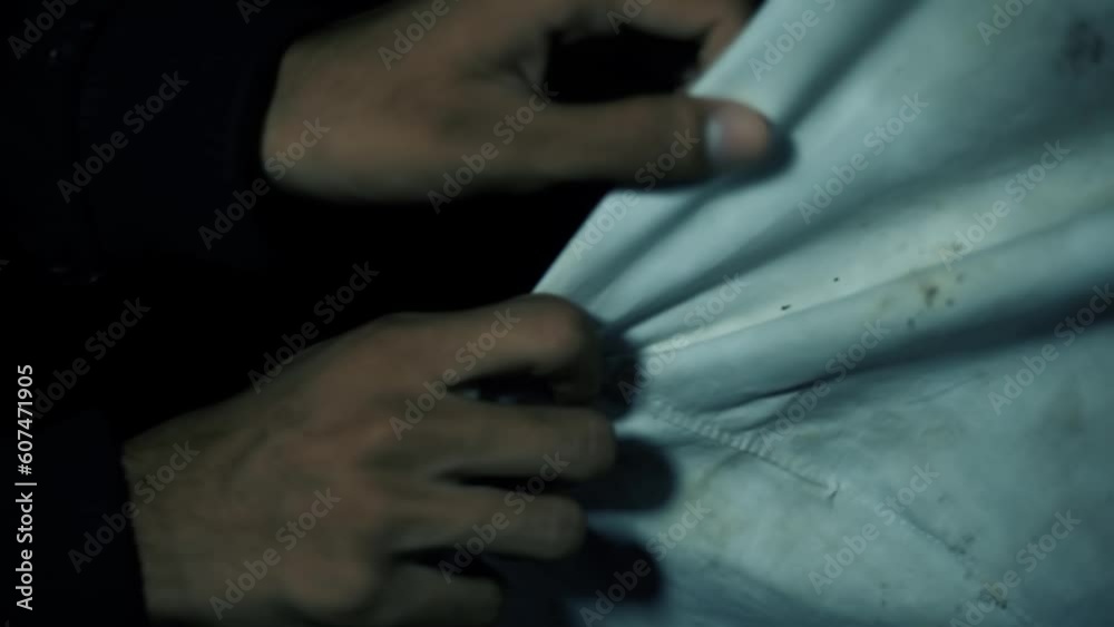 Close-up darkness man pulling the cloth from a mysterious ghost appearing. Creative lights. Hd footage. Close-up darkness man pulling the cloth from a mysterious ghost appearing. Creative lights. Hd footage.