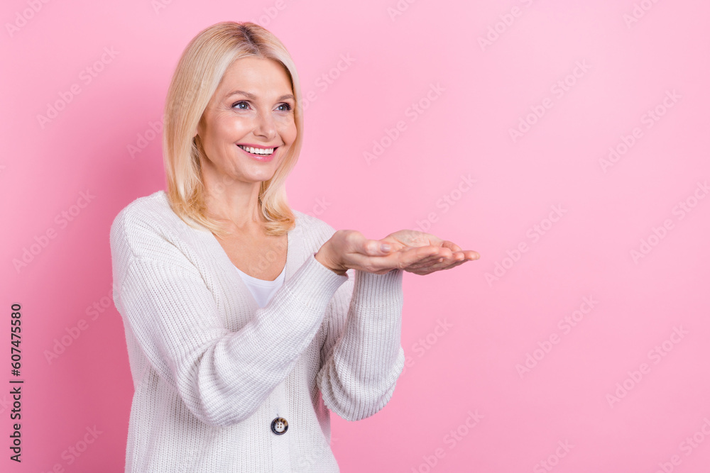 Photo of grateful appreciative woman with bob hairdo dressed knit cardigan palms demonstrate offer isolated on pink color background Photo of grateful appreciative woman with bob hairdo dressed knit cardigan palms demonstrate offer isolated on pink color background