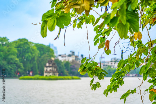 Hoan Kiem Lake ( Ho Guom) or Sword lake in the center of Hanoi in the morning. Hoan Kiem Lake is a famous tourist place in Hanoi. Travel and landscape concept. photo