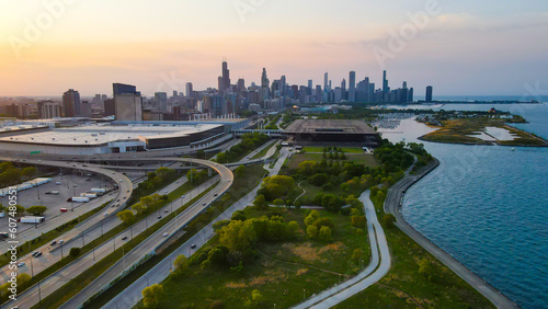aerial drone view of Chicago metropolis from the lake during sunset. the beautiful skyscraper showcases of the wonders of the city architecture. related to business finance and travel 