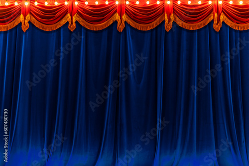 Theater dark blue and red curtain and neon lamp around border..