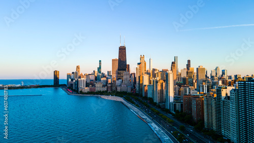 aerial drone view of Chicago metropolis from the lake during high noon. the beautiful skyscraper showcases of the wonders of the city architecture. related to business finance and travel 