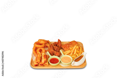 tasty crunchy onion ring, french fries, sausage, fried cheese, pacanga pastry, hot snack plate. Special spice photo