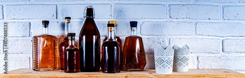 brew, whiskey, brandy, cognac, graffiti on wall, Super Slow Motion Shot of Pouring Whiskey into Glass with Ice Cube at 1000fps with Camera Motion.