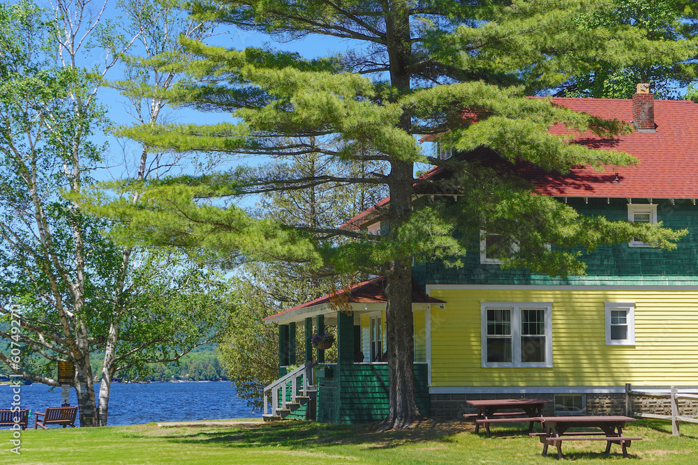 Naklejka premium Inlet, New York: One of the Arrowhead Park Cottages on Fourth Lake in the Adirondack Park, formerly part of the historic Arrowhead Hotel.