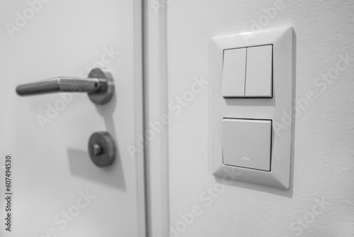Modern switches on light wall